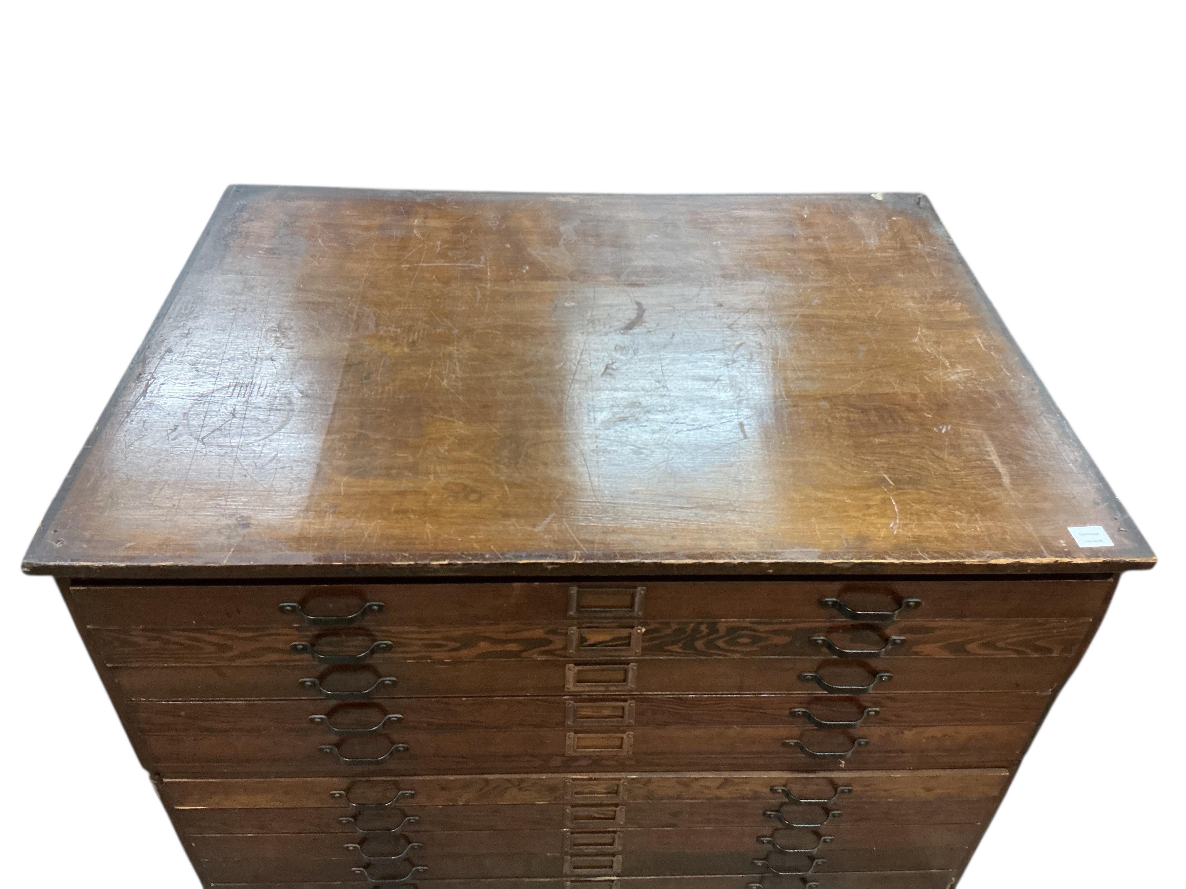 A mid century beech and pine two section ten drawer plan chest, width 123cm, depth 90cm, height 82cm